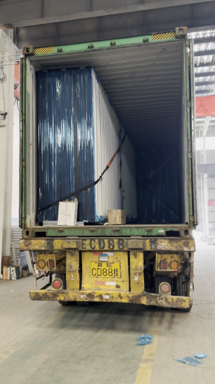 folded folding houses prepared for container loading and overseas shipment